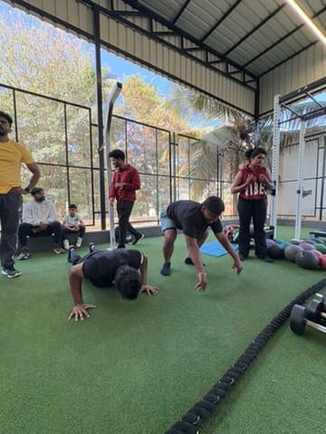 Members and coaches during a group conditioning session at FOMO Training